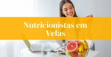 Nutricionistas em Velas com frutas e computadores